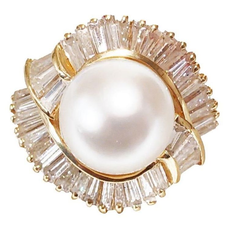 Lady's 3.46 cts diamond ring with 12 mm pearl