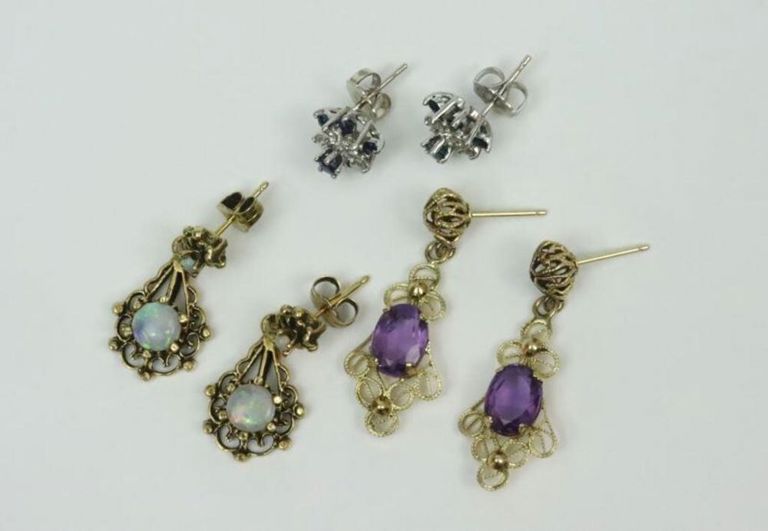 Three pairs of 14k gold earrings