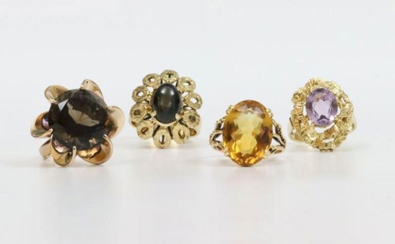 Gold rings with various gemstones