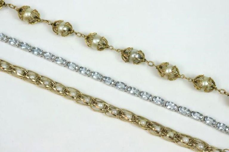 Gold bracelets with gemstones and pearls