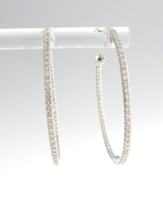 Pair of 14k white gold inside/out diamond hoop earrings