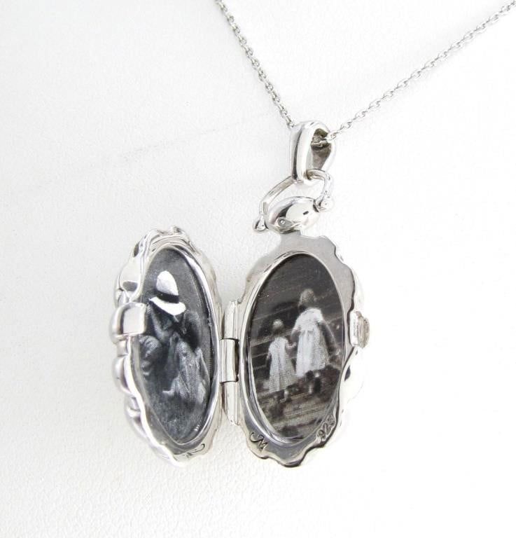 Monica Rich Kossan Sunburst sterling silver locket with chain