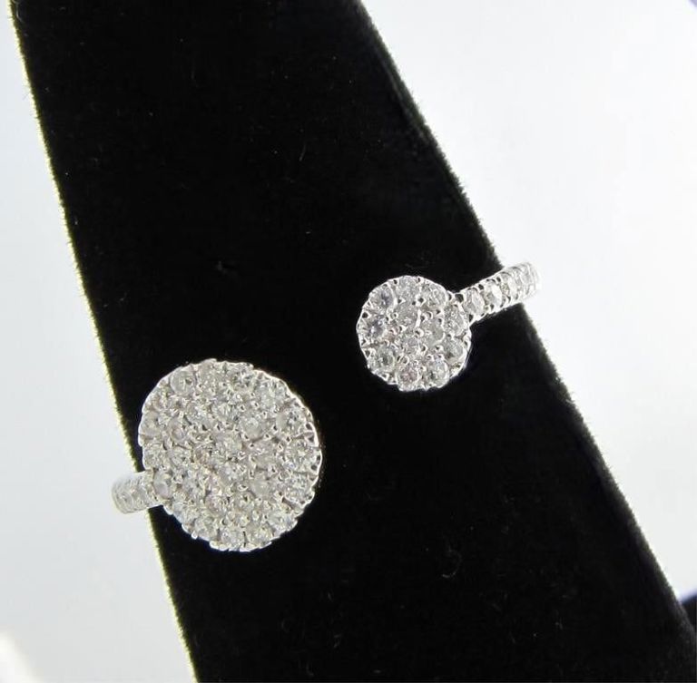 14k white gold open disc ring with diamonds