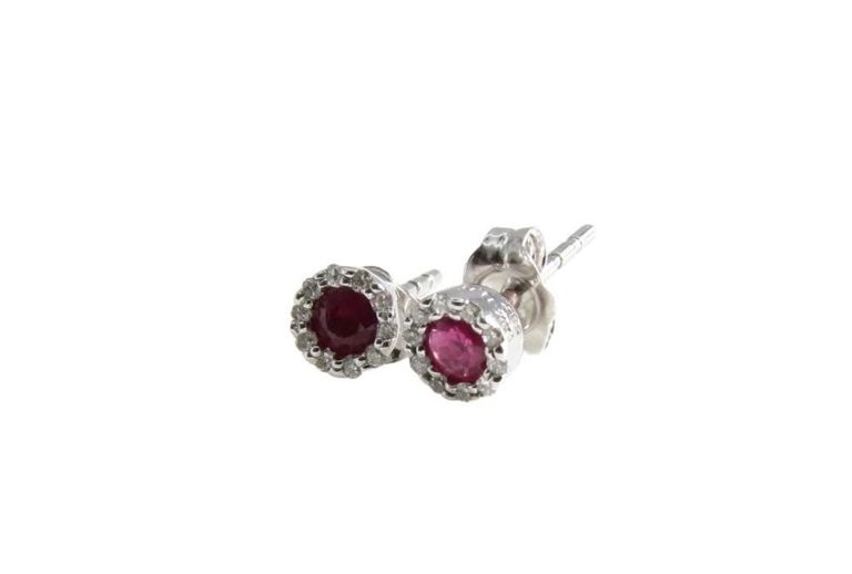 Pair of 14k white gold ruby, diamond stud earrings