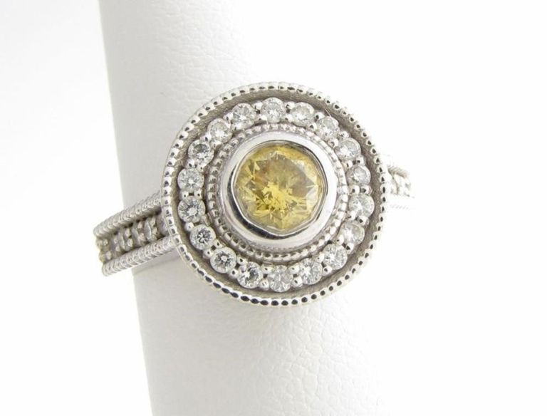 14k white gold lady's ring with yellow and white diamonds