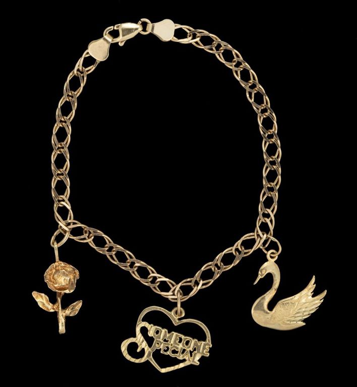 Vintage 14k yellow gold bracelet with 14k gold charms