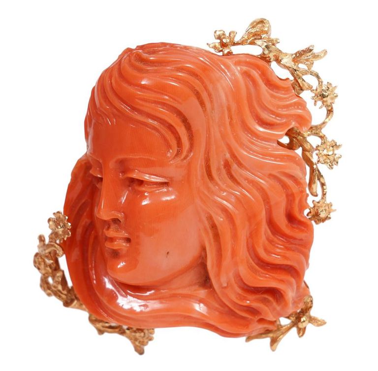 Carved Coral & Gold Figural Brooch