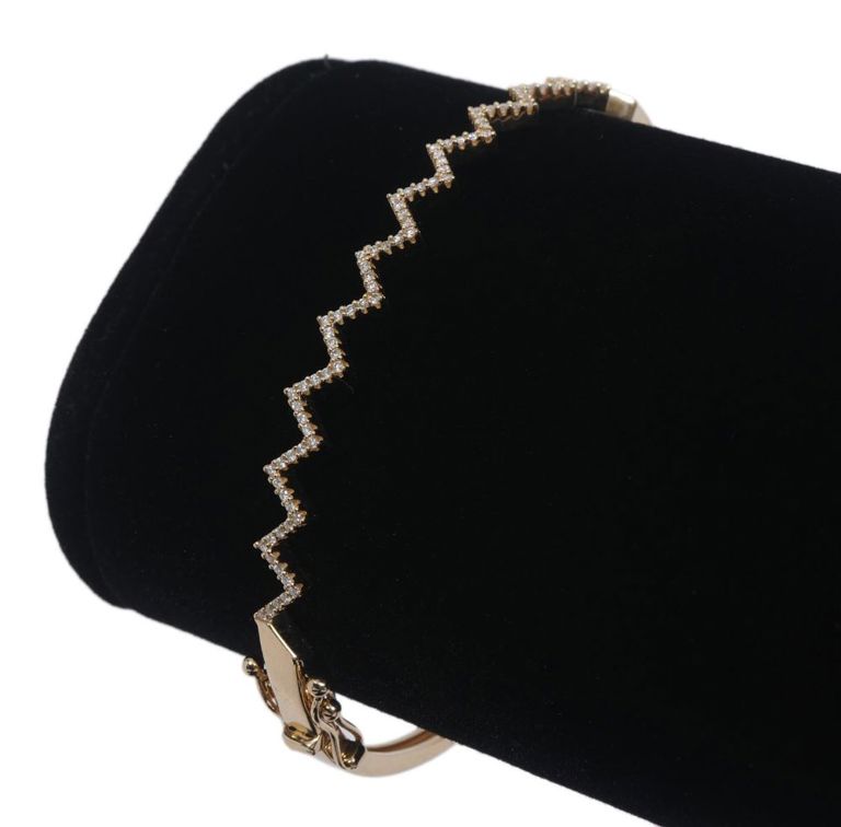 14k yellow gold diamond bangle bracelet with zig zag design