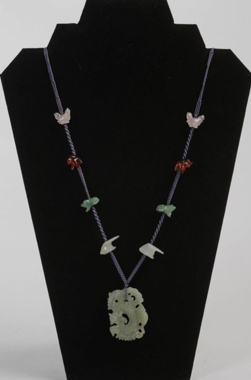 Carved Jade Necklace with Animals.