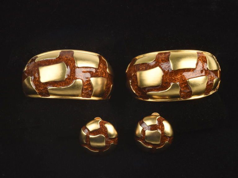 Pair of Animal Print Bracelets and Earrings.