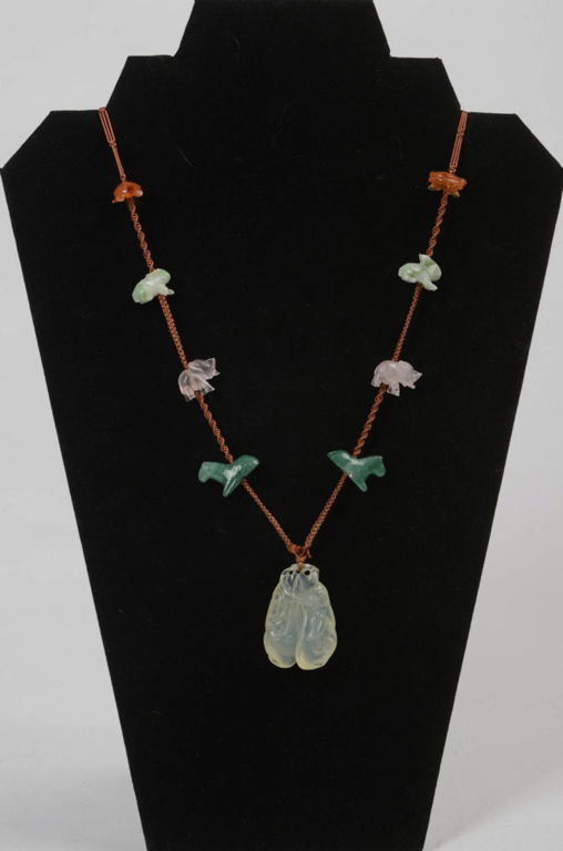 Carved Jade Necklace with Animals.