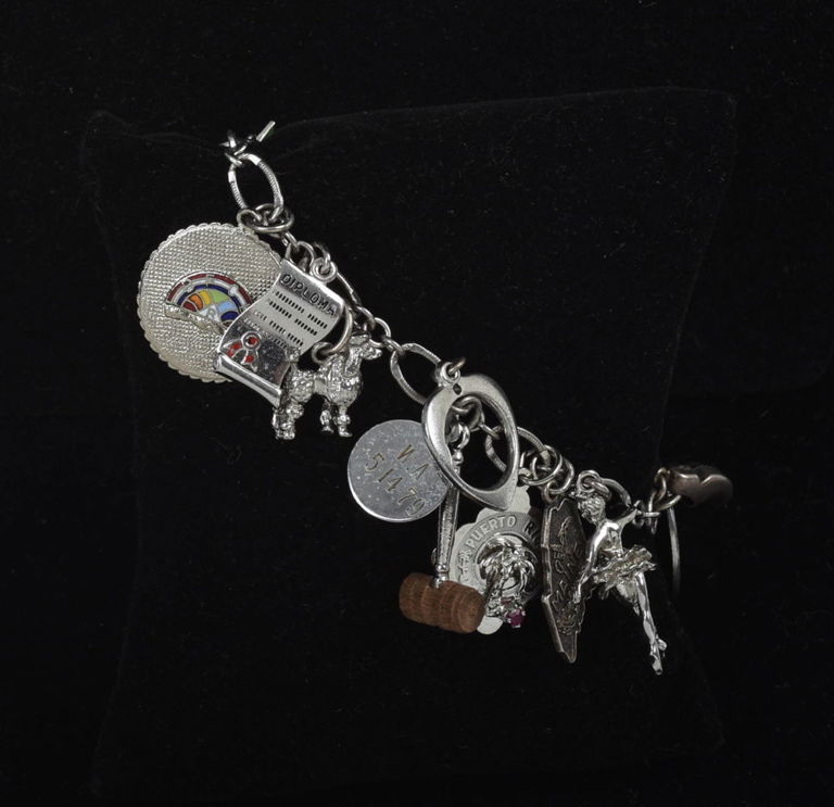 Fifteen Charm Sterling Bracelet.