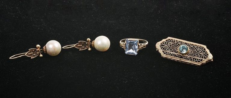 Three pieces of costume jewelry