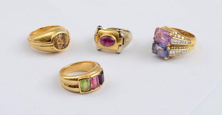 Four 18k gold and gemstone rings