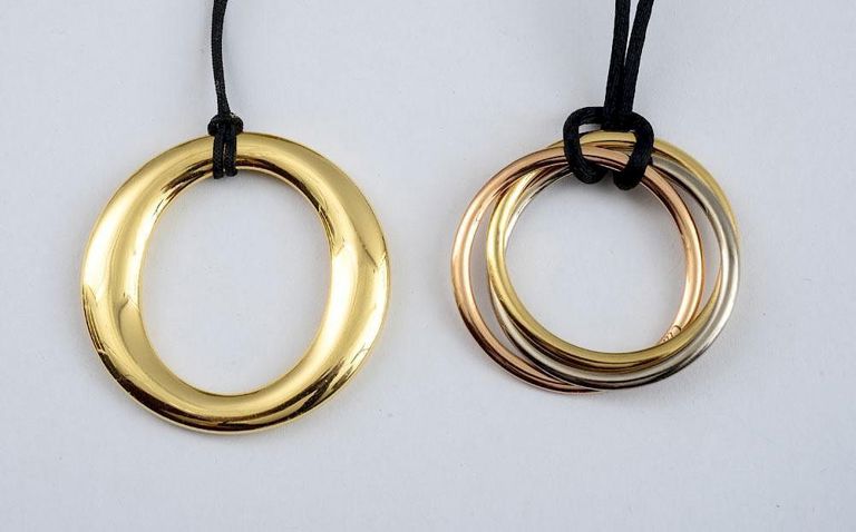 Two 18k Gold Pendants, Tiffany Co. And Cartier