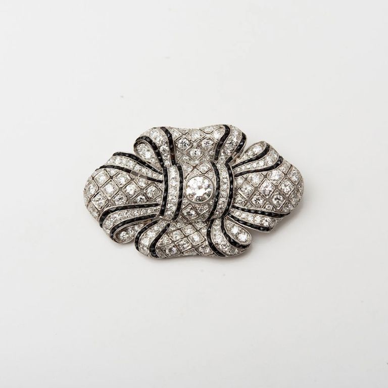 French Art Deco Platinum, Diamond and Black Onyx Bow Brooch