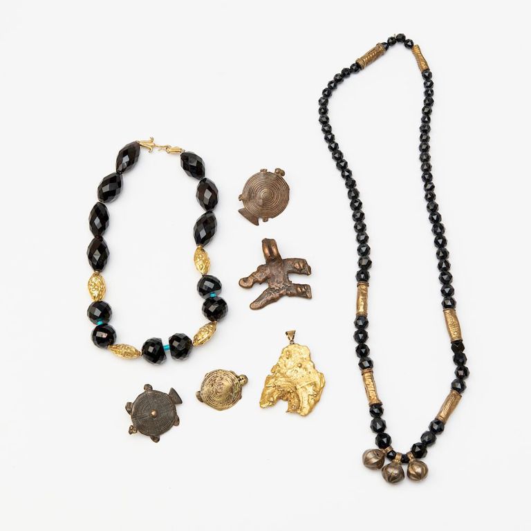 Two Beaded Necklaces and Five Metal Pendants