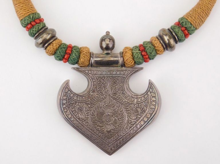 Textile and Silver Pendant