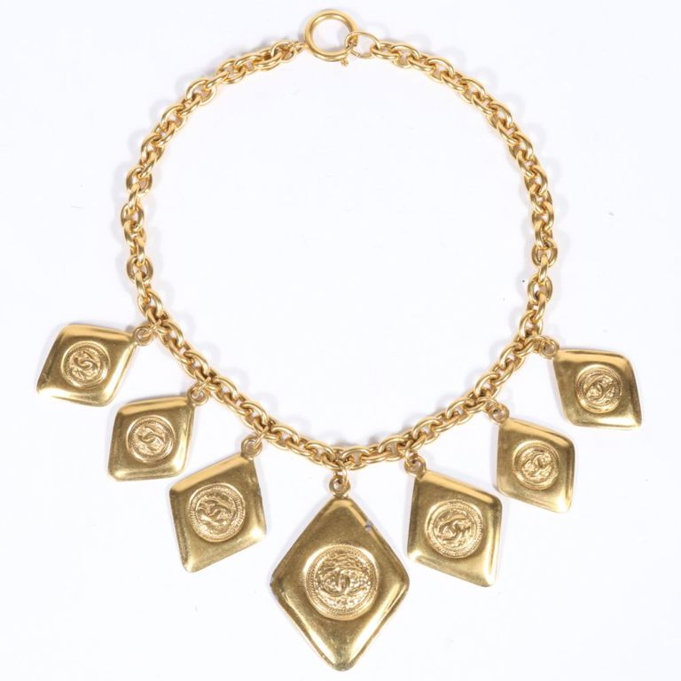 Diamond shaped charm pendants on a chain necklace