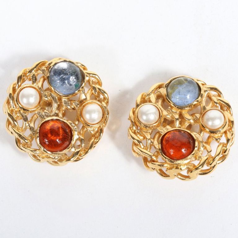 Earrings studded with pearls and blue and orange glass