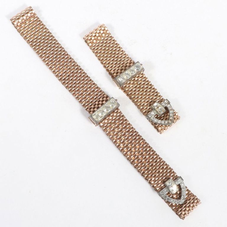 Rose gold tone necklace and bracelet with diamante jeweled buckle slides