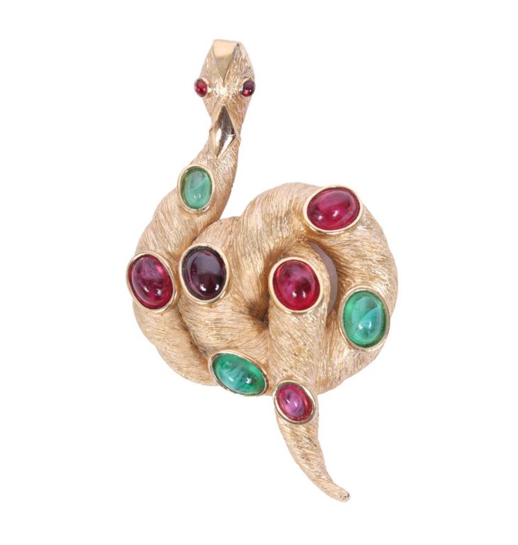 Snake brooch with green and red glass cabochons