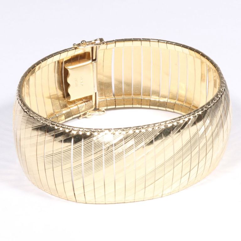 14k yellow gold flexible wide band bracelet