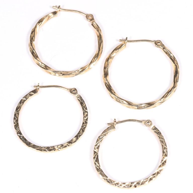 Two pairs of 14k yellow gold hoop earrings