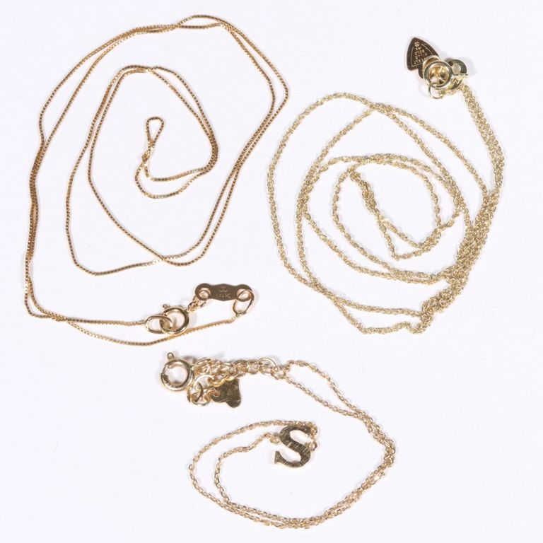 Two 14k yellow gold chain necklaces and monogram "S" bracelet