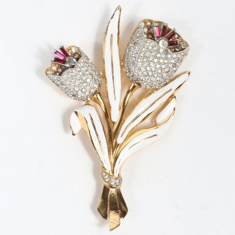 Gold wash and white enamel brooch with rhinestones