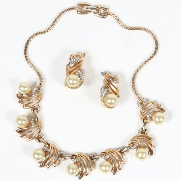 Faux pearl and rhinestones necklace with matching earrings