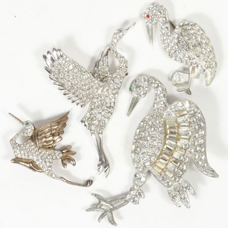 Four diamante and pave rhinestone crystal bird brooches