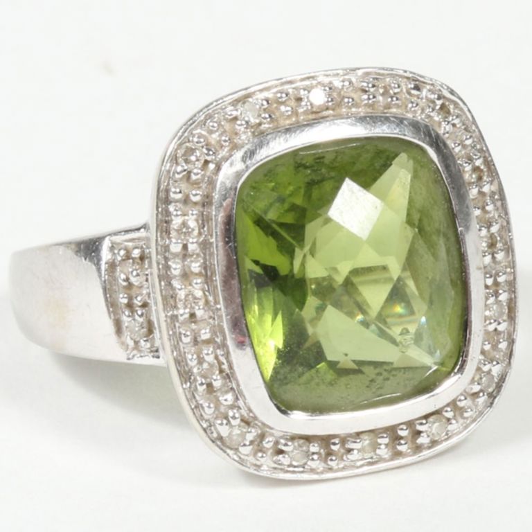 14k white gold ring with peridot and diamond halo