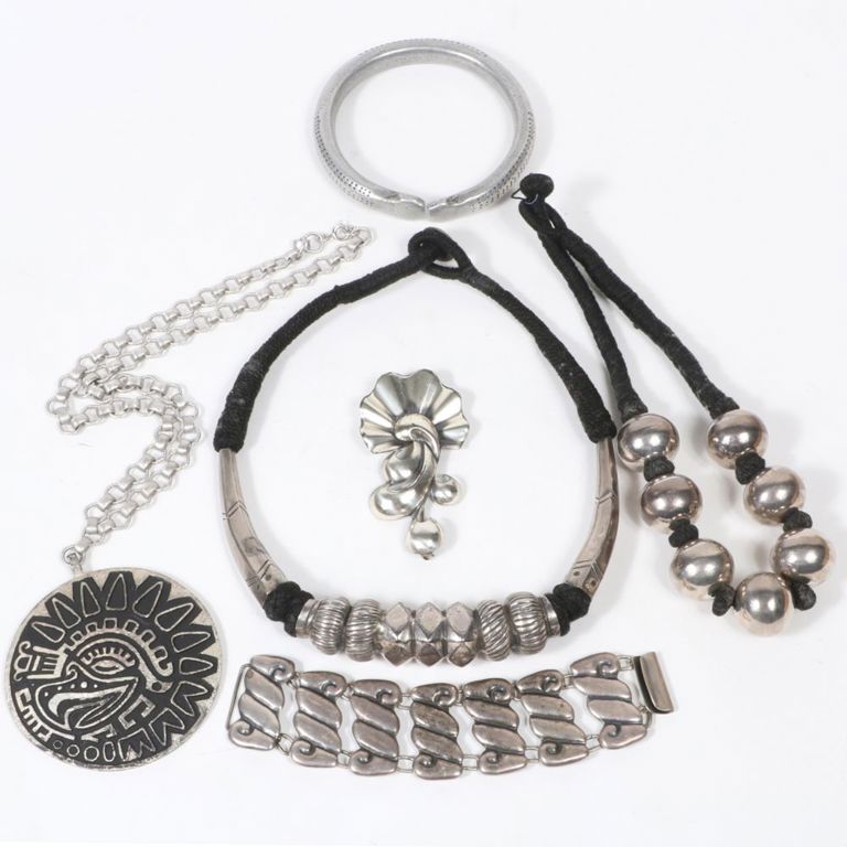 Six piece costume jewelry group