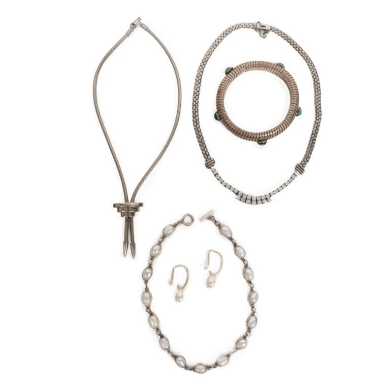 Five piece jewelry group: three necklaces, earrings and bracelet
