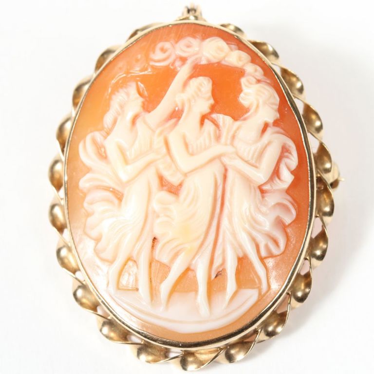 Low karat yellow gold shell cameo pendant brooch