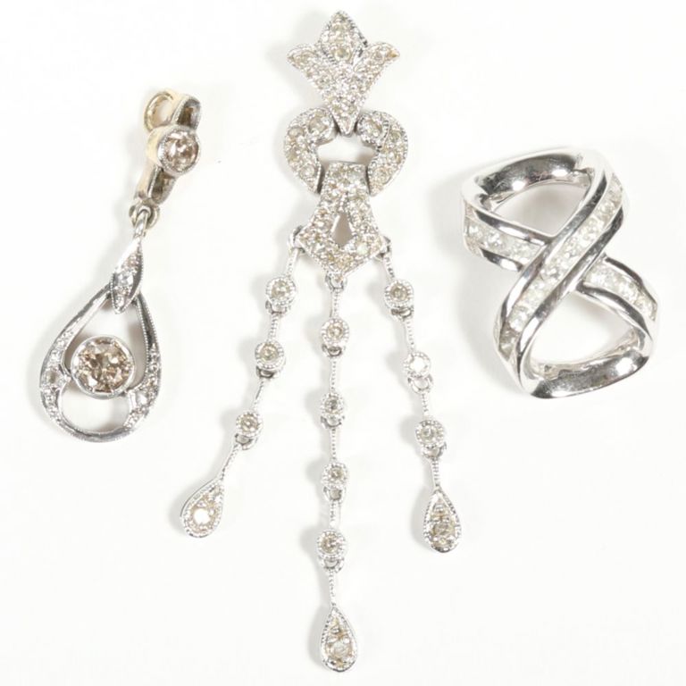 Three gold pendants with diamods