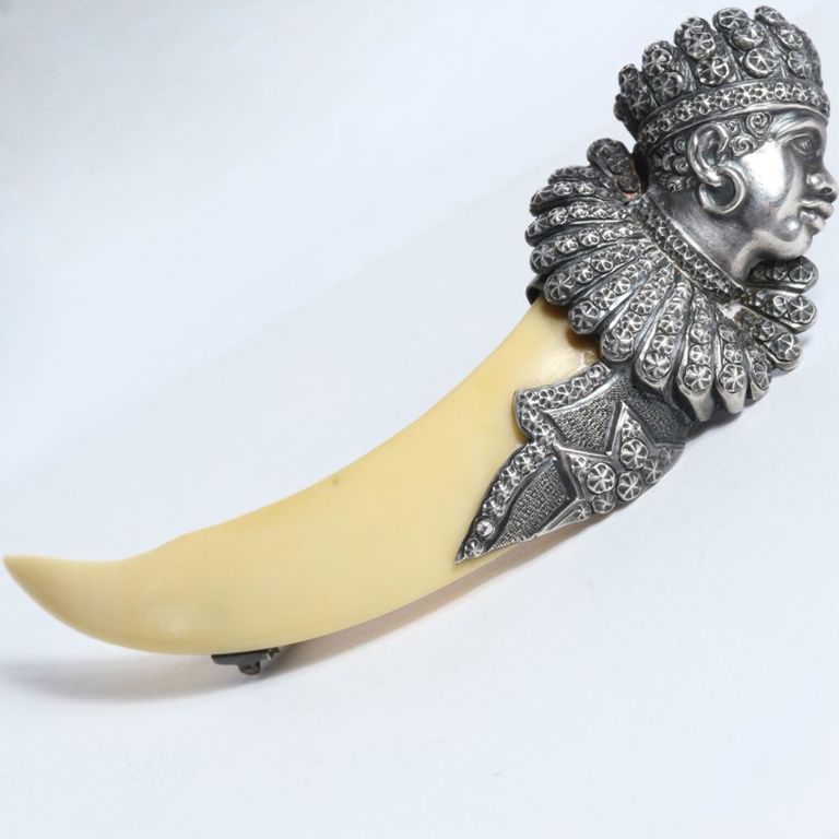 Sterling silver and bone/tooth brooch