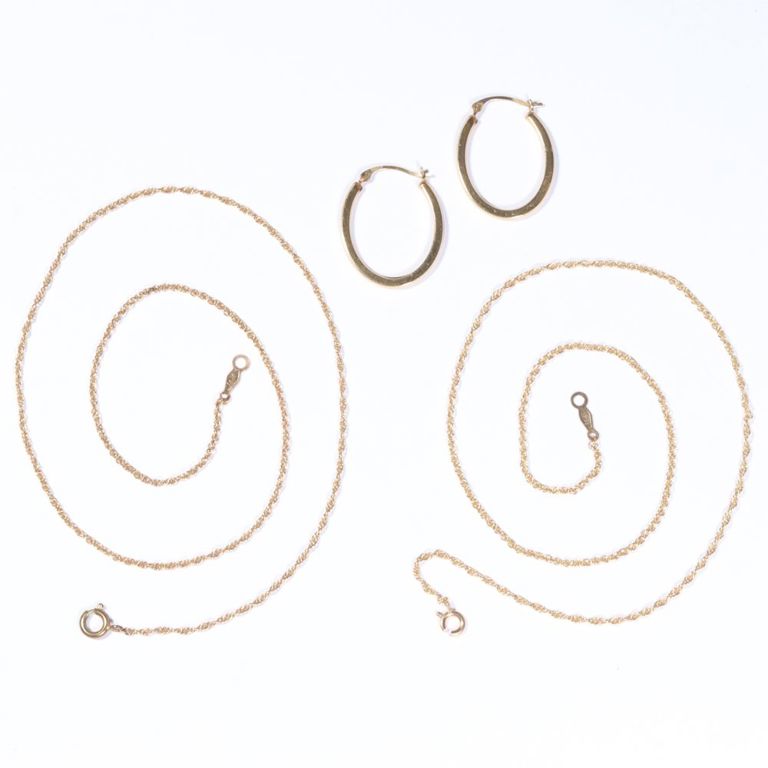 14k yellow gold group with two chain necklaces and hoop earrings