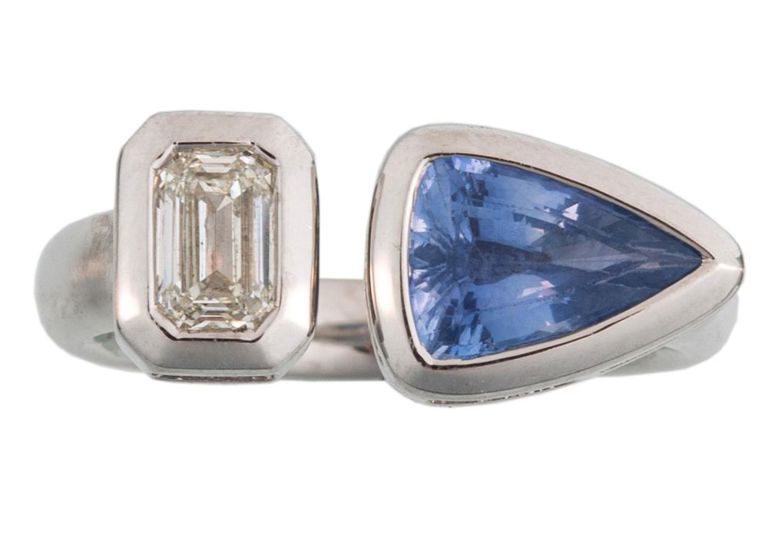 Platinum blue sapphire and diamond ring