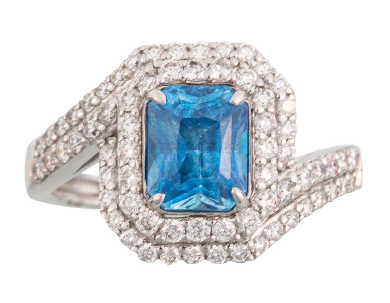 Platinum blue sapphire and diamond ring