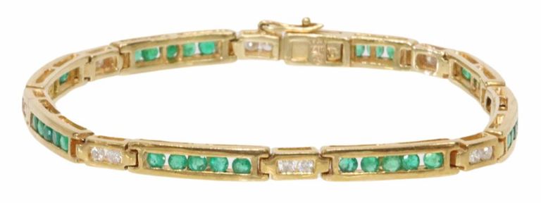 14k yellow gold line bracelet with emeralds and diamonds