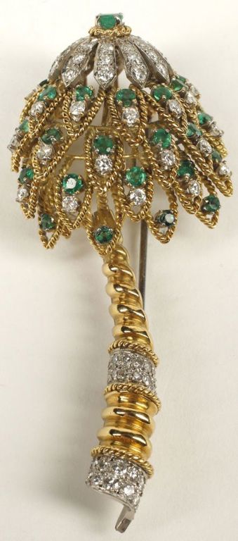 Estate 18k yellow and white gold brooch with emeralds and diamonds