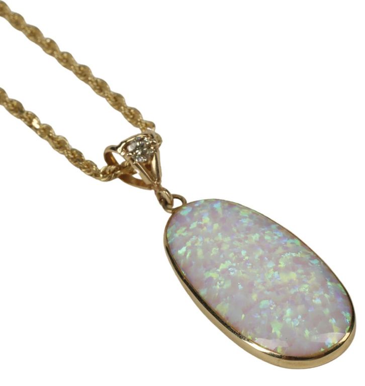 14k yellow gold pendant with opal and diamond on rope chain