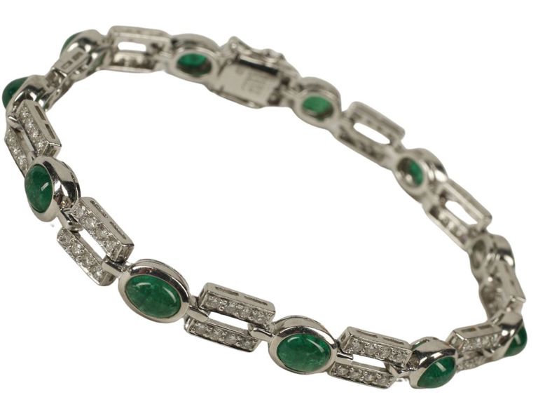 Estate Art Deco style platinum bracelet with diamonds and emeralds