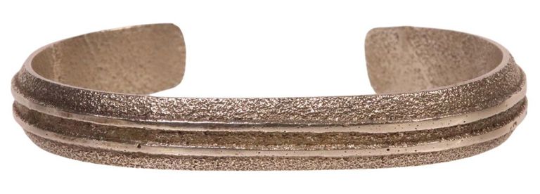 Native American tufa-cast silver cuff bracelet