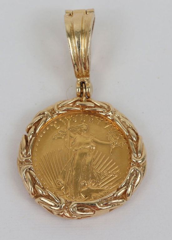 24k gold coin pendant with 14k gold bezel