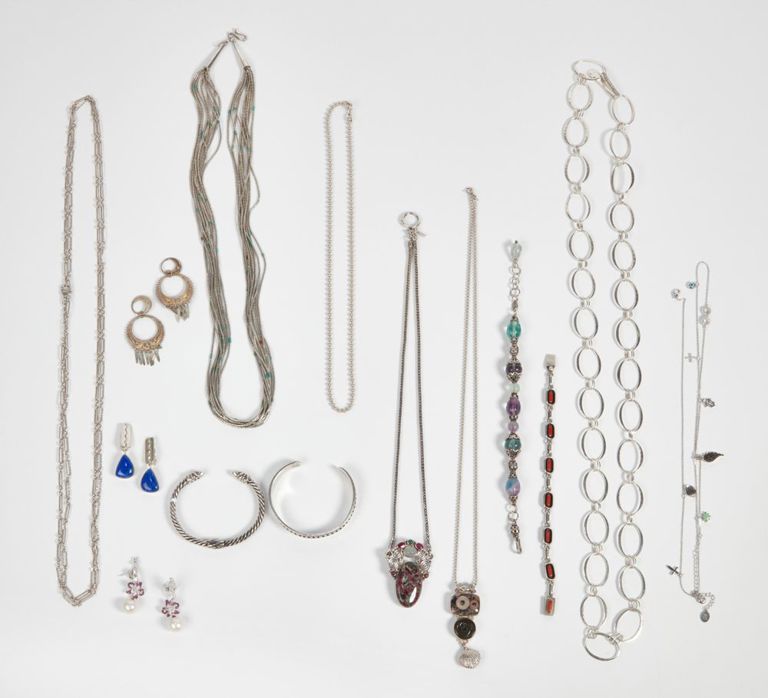 Collection of fourteen silver, metal, and hardstone jewelry pieces