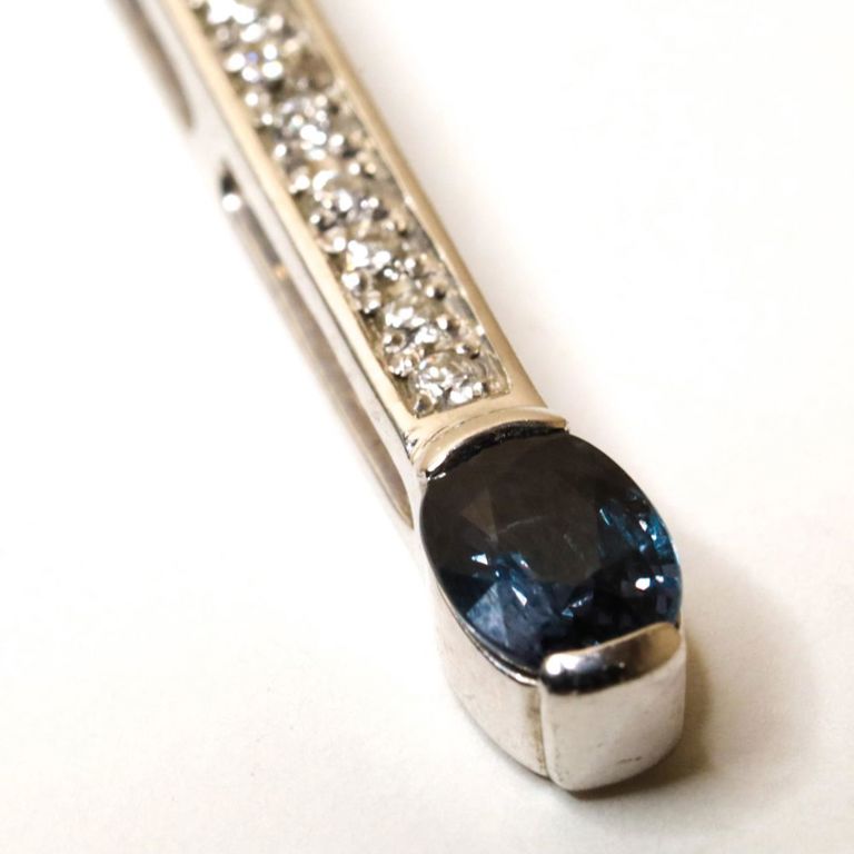 Platinum garnet and diamond pendant on necklace