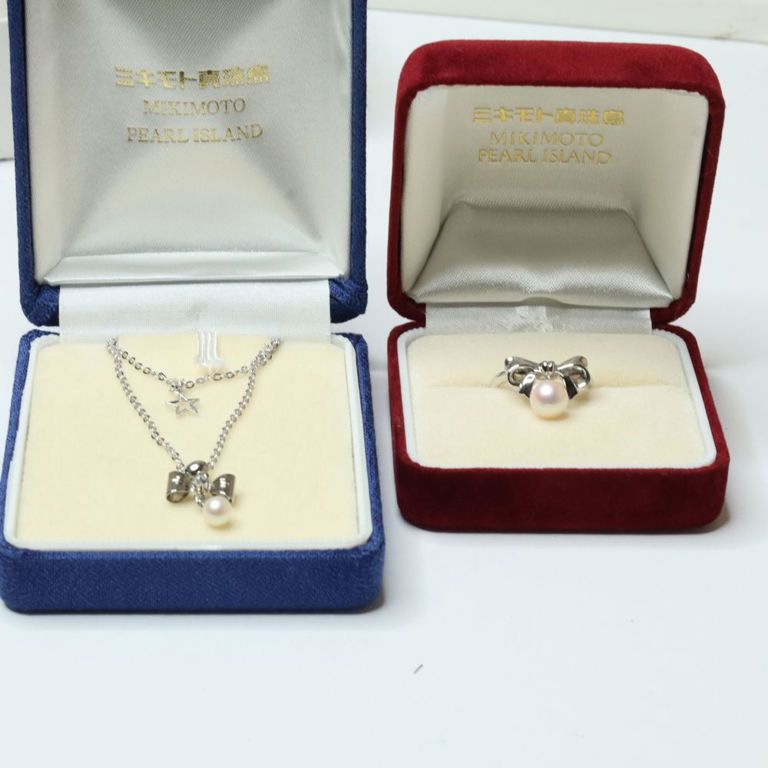 Sterling silver pearl ribbon ring and a pearl necklace